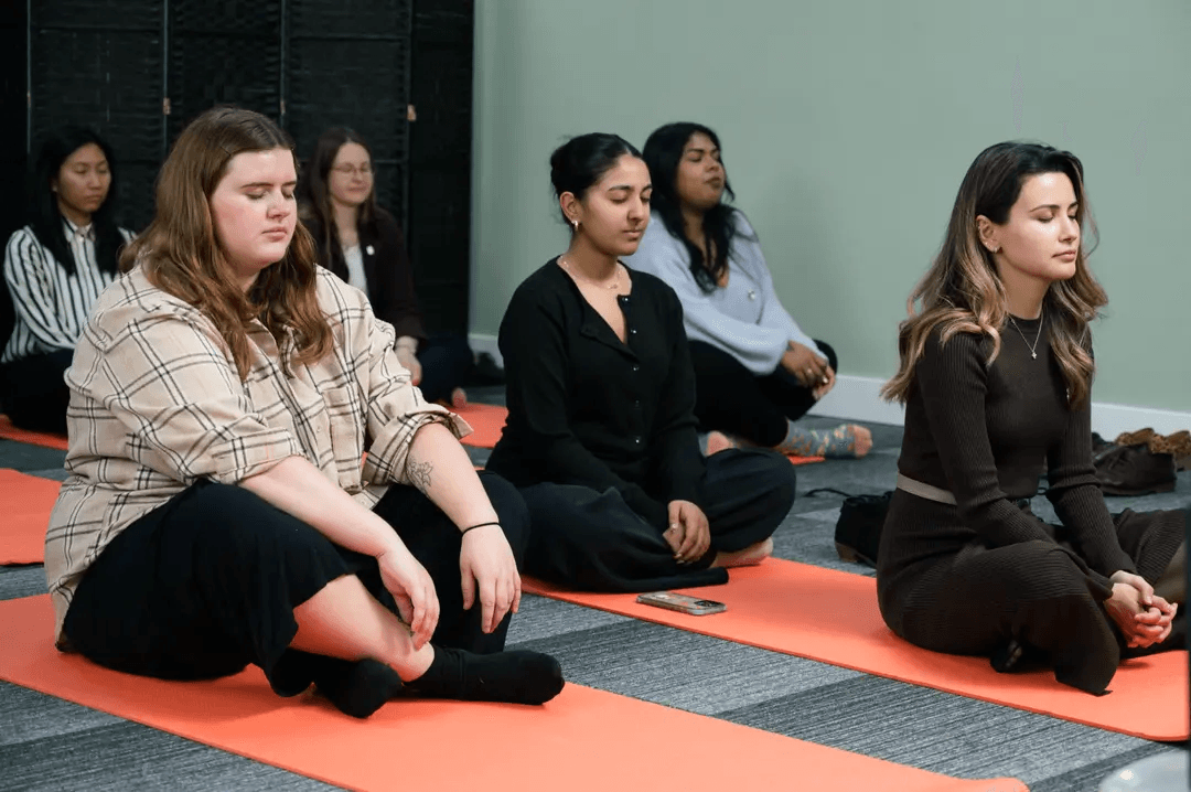 Students taking part in a wellbeing workshop